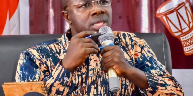 Jefferson T. Koijee former Mayor of Monrovia speaking in a microphone