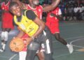 LPRC Oilers player in action against Mighty Barrolle in LBA First Division matchup