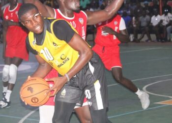 LPRC Oilers player in action against Mighty Barrolle in LBA First Division matchup