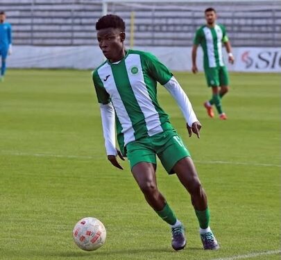 Liberian footballer Jenkins Sieh on the pitch during his stint with FK Apolonia in Albania, before returning home amid a scandal involving contract breaches and unpaid wages.