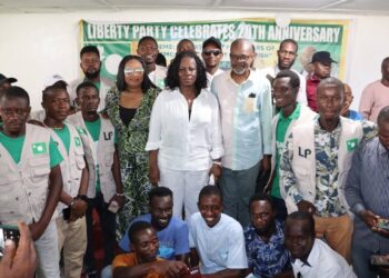 Liberty Party members and leaders pose during 20th anniversary celebration honoring founder Charles Brumskine