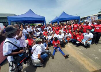 Women sitting on floor in bid to end stigma against menstrual hygiene