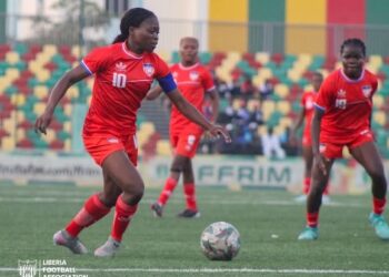 Liberia’s deputy captain Mimi Eiden controls the ball during a WAFU Zone A Women’s Cup match against Mauritania, with teammates in support.