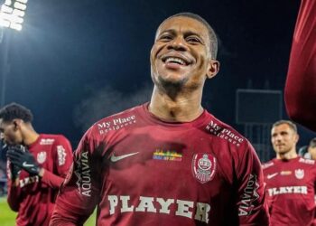 Liberian striker Mohammed Kamara celebrates with CFR Cluj teammates after winning the Romanian Cup