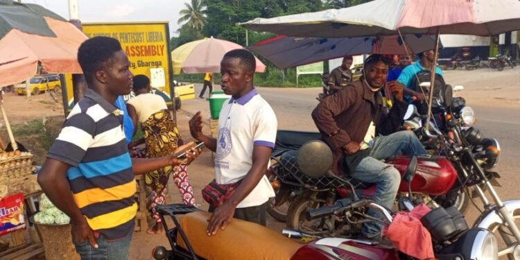 Motorcyclists and vendors in Gbarnga, Bong County, discuss declining income and economic hardship under the Unity Party-led administration.