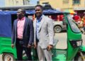 NEEV Liberia officials pose beside one of their newly launched electric tricycles in Monrovia, part of the company’s e-mobility drive toward sustainable transportation.
