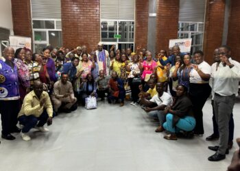 Rotary District Governor Paulin Salambre poses with Liberian Rotarians during her official visit promoting peacebuilding and inclusive service.