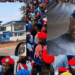 entrance of CDC headquarters, George Weah and crowd