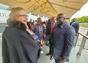 Liberian Maritime Commissioner Cllr. Neto Zarzar Lighe Sr. greets a delegate during the official launch of Liberia’s IMO Category A re-election campaign aboard the Silver Barracuda in London, May 26, 2025.