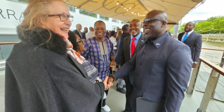 Liberian Maritime Commissioner Cllr. Neto Zarzar Lighe Sr. greets a delegate during the official launch of Liberia’s IMO Category A re-election campaign aboard the Silver Barracuda in London, May 26, 2025.