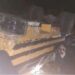 Overturned passenger bus at night after fatal crash near Gbarkor Hill, Bong County, Liberia