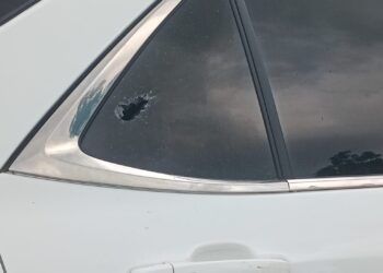 Bullet hole in car window allegedly caused by police gunfire during a disputed land eviction in Mount Barclay, Liberia, June 10, 2025.