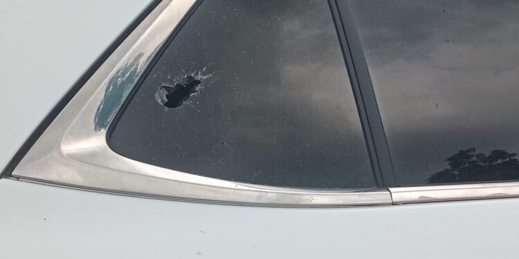 Bullet hole in car window allegedly caused by police gunfire during a disputed land eviction in Mount Barclay, Liberia, June 10, 2025.