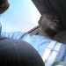 Undercover image of Amara Dukuly, a Liberian-born U.S. immigration officer, inside a vehicle during a sting operation related to a $20,000 federal bribery investigation.