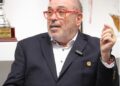 Avi Zaidenberg of LISCR speaks during LFA ceremony honoring contributions to Liberian football