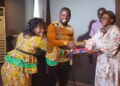 ActionAid Liberia officials and civil society leaders present a joint communiqué to a government representative, calling for reforms in public resource governance and inclusive financing