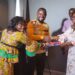 ActionAid Liberia officials and civil society leaders present a joint communiqué to a government representative, calling for reforms in public resource governance and inclusive financing