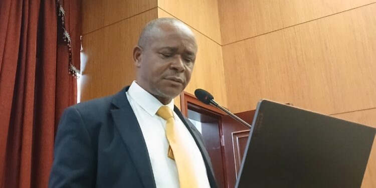 NIR Executive Director Andrews Peter delivering remarks to Liberia’s House of Representatives amid backlash over the biometric national ID program's delays and costs.