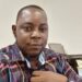 Augustine Tamba, former president of the Federation of Liberian Youth and executive director of LEOG, photographed at his office prior to his passing.