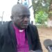Bishop Kortu Brown addresses the media, criticizing the Liberian government’s timing of opposition lawmakers’ arrests during a national celebration