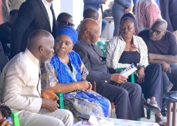 President Joseph Boakai and Foreign Minister Sara Beysolow Nyanti sit with the Doe family during a condolence visit in Monrovia ahead of the planned joint burial in Zwedru.