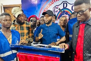 CDC Youth League leader addresses supporters during a press conference, denouncing President Boakai and calling for community-based political actions across Liberia.