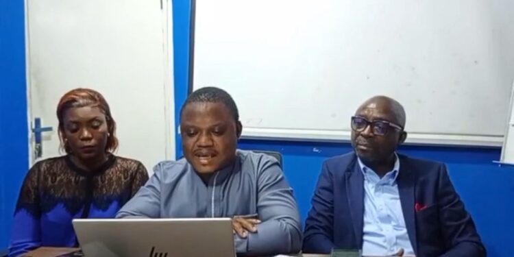 Liberian civil society leaders including Anderson D. Miamen, Esther Yango, and George Sagbeh address the press in Monrovia, warning against proposed amendments to the Local Government Act.