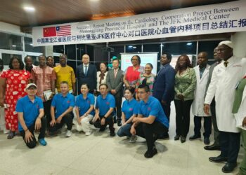 Chinese and Liberian medical officials pose together during the dedication of Liberia’s first cardiology unit at JFK Medical Center, donated by China’s Heilongjiang Provincial Hospital.