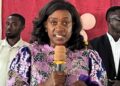 Former First Lady Clar Weah speaks at a graduation ceremony in Kakata, encouraging vocational graduates to embrace their small beginnings and strive for a better future.