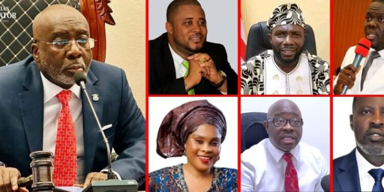 ollage of former House Speaker Jonathan Fonati Koffa (left) seated behind a microphone and gavel, alongside six other Liberian lawmakers — Frank Saah Foko, Abu B. Kamara, Dixon W. Seboe, Priscilla A. Cooper, J. Marvin Cole, and Jacob C. Debee — all named as persons of interest in the December 2024 Capitol Building arson investigation.