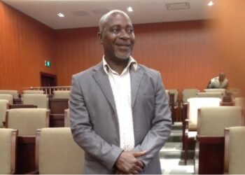 Deputy Chief Clerk Commicks Chea stands inside the chamber of Liberia’s House of Representatives, days before his untimely passing.