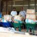 Stacks of sanitation materials including wheelbarrows and boxes donated by Conservation International to Harper City Corporation, Liberia.