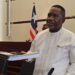 Labor Minister Cllr. Cooper W. Kruah presents a detailed report to the Liberian Senate defending over 10,000 work permits issued in 2024.