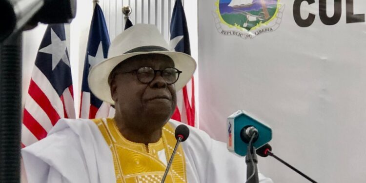 NCHE Executive Director Edward Lama Wonkeryor addresses reporters at the Ministry of Information in Monrovia during the announcement of Liberia’s college shutdowns and suspensions