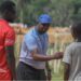 FIFA Talent Coach Ammy Ninje interacts with young footballers in Liberia during a nationwide scouting tour under the FIFA Talent Development Scheme.
