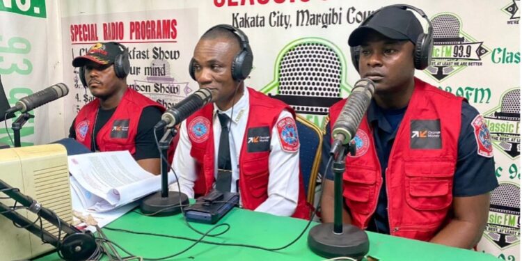 Liberia National Fire Service officials speak live on Classic FM in Kakata, announcing Margibi County’s selection for a new fire truck as part of a national emergency response upgrade.