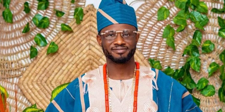 Fred Ola, founder of Big Brabee Liberia, dressed in traditional Nigerian attire, amid calls for the return of Liberia’s pioneering reality TV show