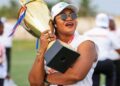 Determine Girls FC President Grace Hawa Weah celebrates with a championship trophy after the LFA lifted her suspension and imposed revised sanctions.