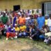 Community leaders and residents of Grand Kru County gather for the official signing of a landmark mangrove conservation pact, pledging to protect coastal ecosystems and promote sustainable practices in southeastern Liberia