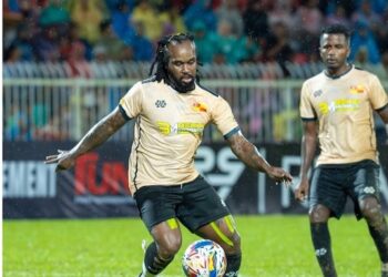 Francis “Grandpa” Doe controls the ball during a friendly match for Ex-Selangor in Malaysia, June 2025.