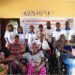 Group of 77 members, including persons with disabilities, gather for a donation ceremony with officials of the Unification Movement of Liberia at their Monrovia headquarters.