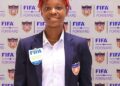 Liberian FIFA assistant referee Hannah Moses poses in official Liberia Football Association blazer after being selected to officiate at WAFCON 2025 in Morocco.