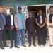 LDEA officials and U.S. DEA delegation pose for a group photo in front of LDEA headquarters in Monrovia after discussions on strengthening anti-narcotics cooperation.