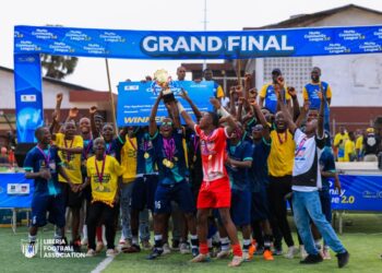 New Kru Town U-17 team celebrates with the trophy after winning the 2025 Lonestar Cell MTN MoMo Community League final in Monrovia.