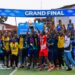 New Kru Town U-17 team celebrates with the trophy after winning the 2025 Lonestar Cell MTN MoMo Community League final in Monrovia.