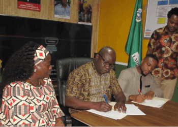 LMHRA and Kulinda Liberia Inc. officials sign MoU in Monrovia to launch a nationwide medicine verification and traceability program