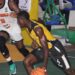 LPRC Oilers player drives past a Mighty Barrolle defender during their First Division League clash at SKD Gymnasium