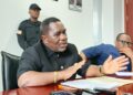 Liberian Labor Minister Cllr. Cooper Kruah addresses the press following the revocation of 19 foreign work permits amid a national audit of alien employment practices.