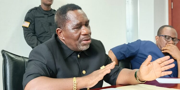Liberian Labor Minister Cllr. Cooper Kruah addresses the press following the revocation of 19 foreign work permits amid a national audit of alien employment practices.
