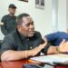 Liberian Labor Minister Cllr. Cooper Kruah addresses the press following the revocation of 19 foreign work permits amid a national audit of alien employment practices.